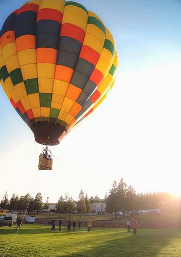 hot air balloon person riding hot air balloon aircraft